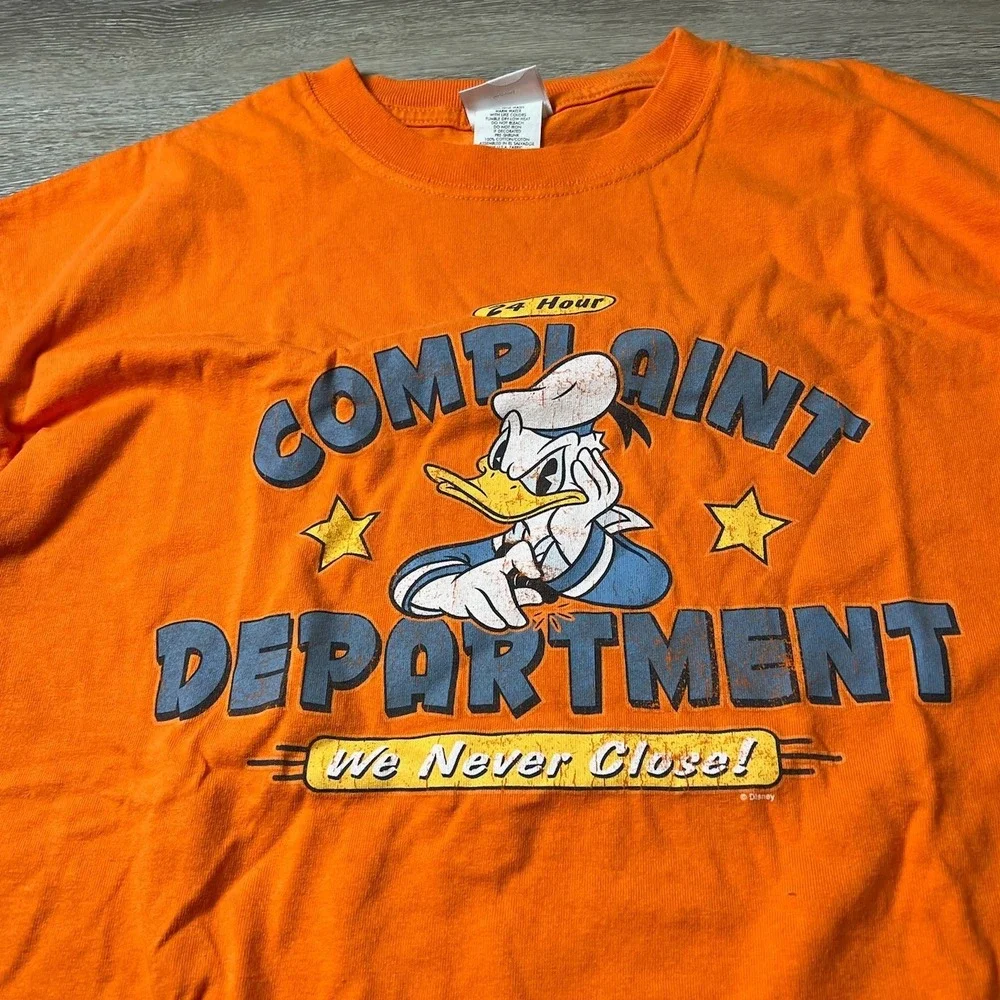 Disney Store Donald Duck T Shirt Mens Large Orange Complaint Department Graphic